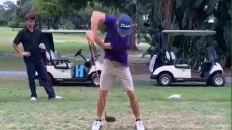 Crazy REVERSE golf swing causes social media meltdown
